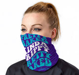 Woman wearing StonerDays Pretty Baked Blue Gaiter, versatile face mask with bold lettering