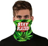 StonerDays Stay Blazed neck gaiter in red and white with cannabis leaf design, front view on model