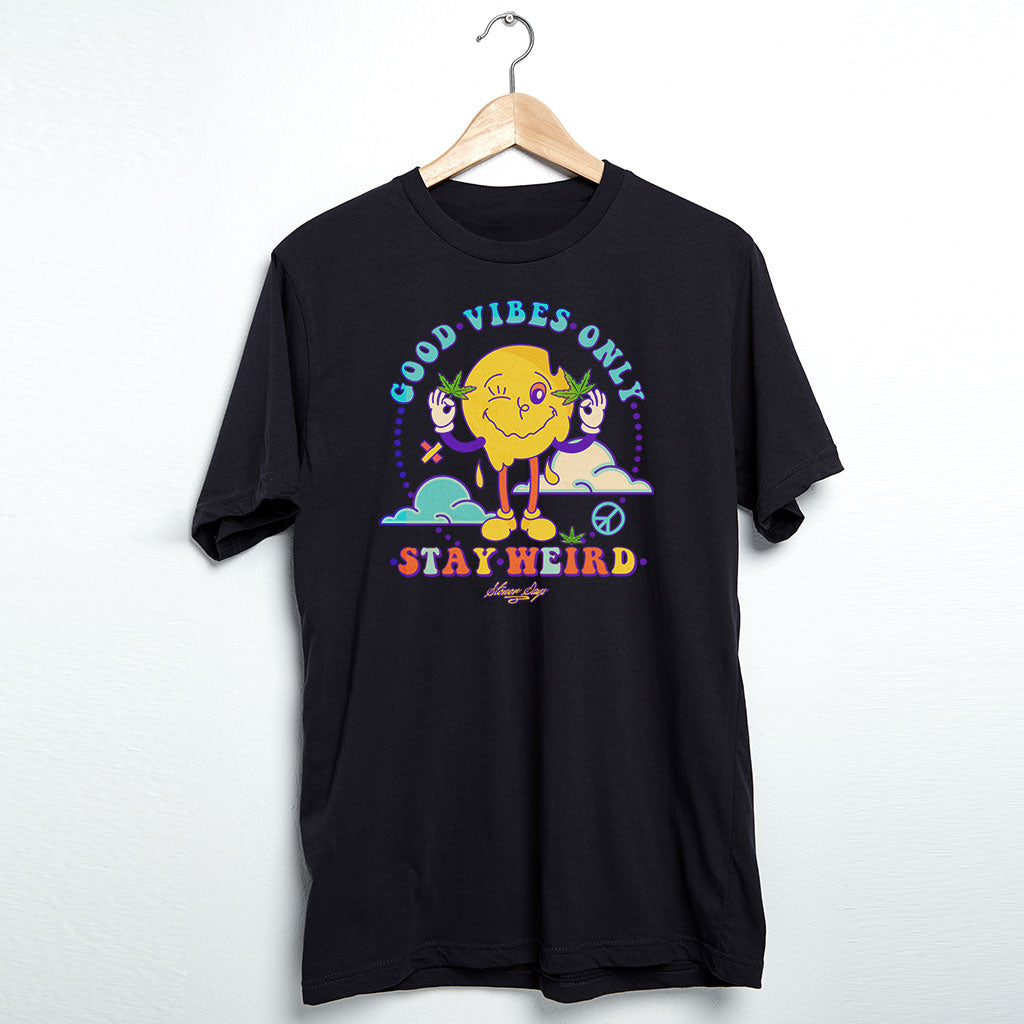 StonerDays Stay Weird men's black cotton t-shirt with colorful graphic, front view on hanger