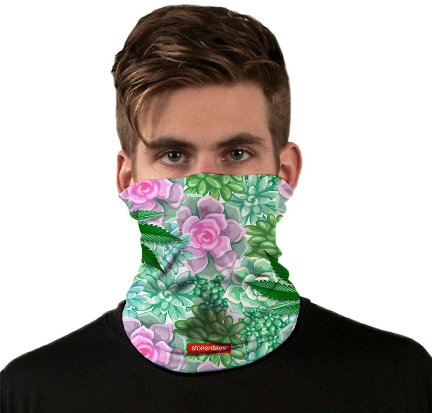 Front view of a person wearing StonerDays Succulents And Sativas Neck Gaiter with floral design