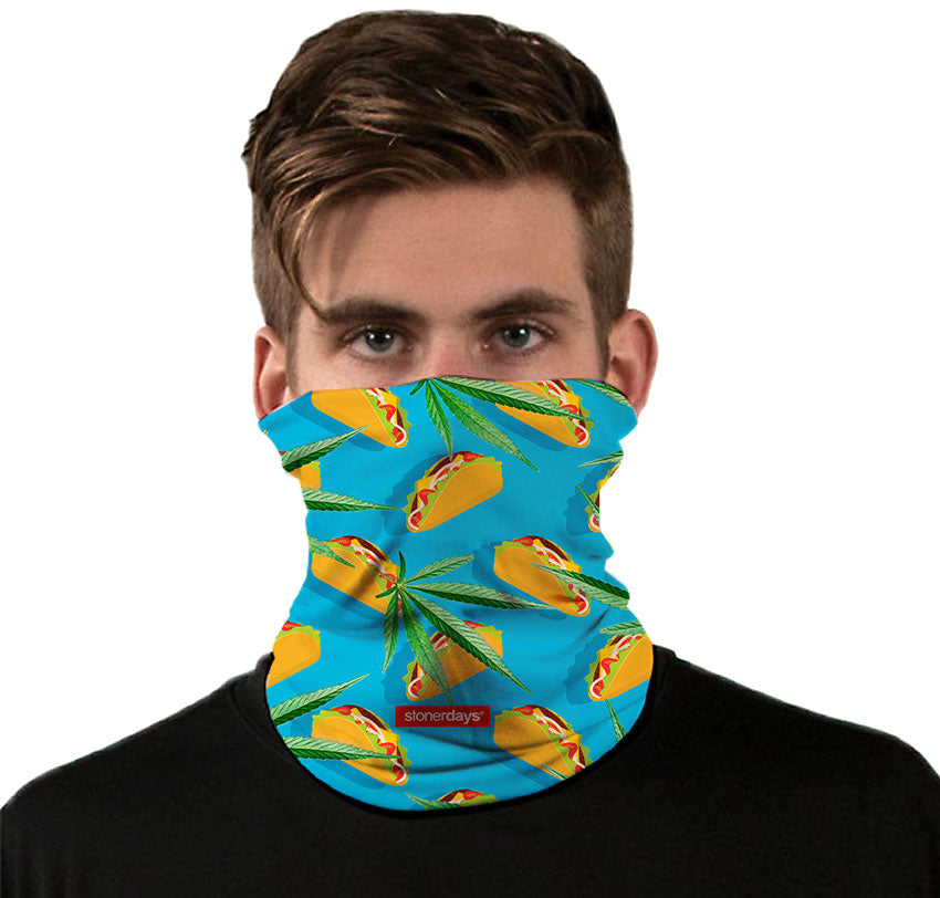 StonerDays Taco Tuesday Neck Gaiter featuring vibrant taco and leaf design, front view on model