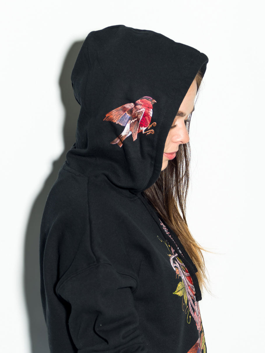 Side view of woman wearing StonerDays True Love black cotton crop top hoodie with bird design