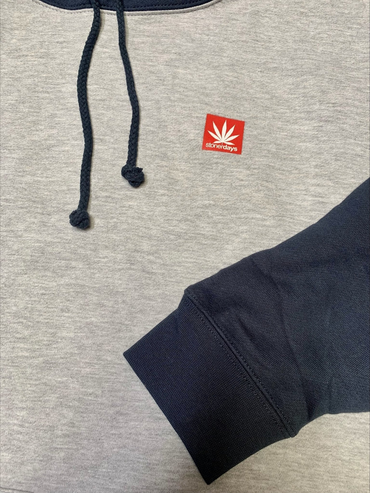 Close-up of StonerDays Two Tone Hoodie in small, showcasing logo and high-quality cotton blend