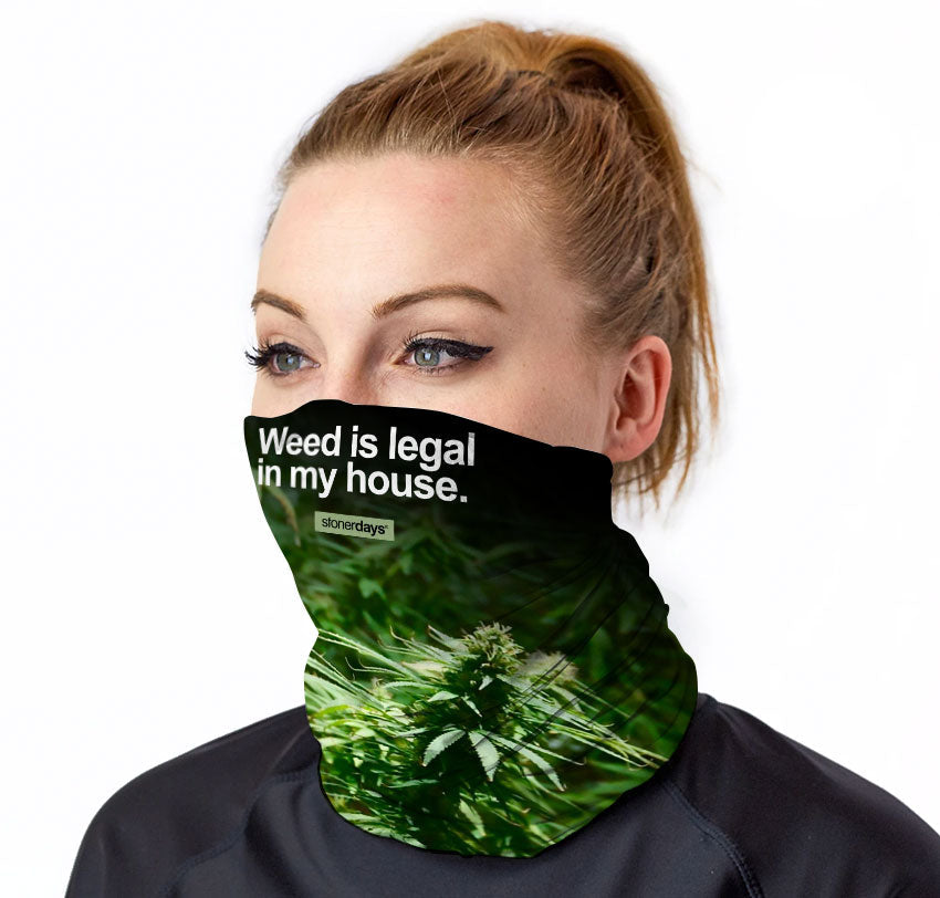 StonerDays neck gaiter with "Weed Is Legal In My House" text, front view on model