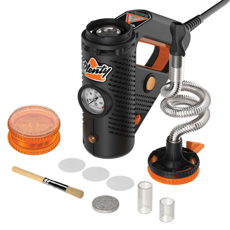 Storz & Bickel Plenty Vaporizer with accessories for dry herbs, angled view on white background