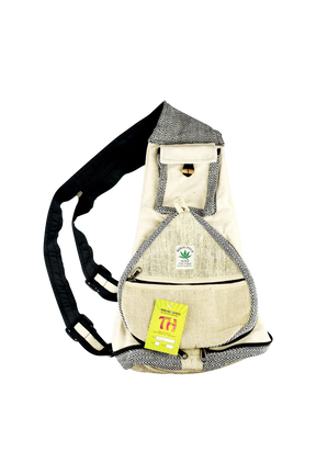 ThreadHeads Himalayan Hemp Convertible Sling Pack in tan with black accents, front view on white background.