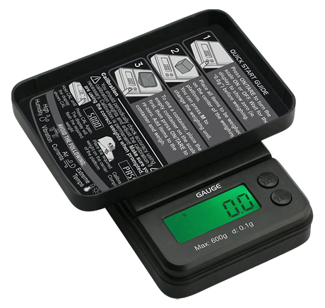 Truweigh Gauge Digital Mini Scale open with backlit display showing 0.00, portable design, 600g x 0.1g