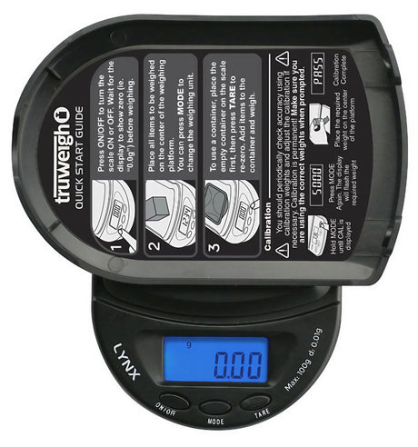 Truweigh Lynx Digital Mini Scale in black, open lid, displaying 0.00, portable design, battery-powered