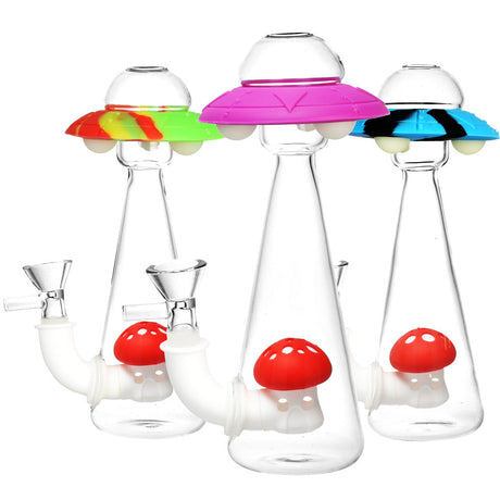 Silicone and glass UFO-themed water pipes with glow-in-the-dark feature, 7" height, front view