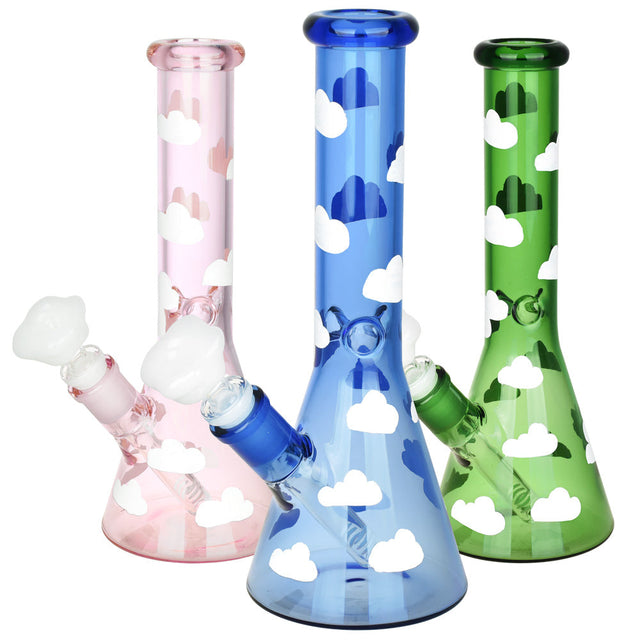 Up in the Clouds Beaker Water Pipes in pink, blue, and green with cloud design, 10 inches tall.