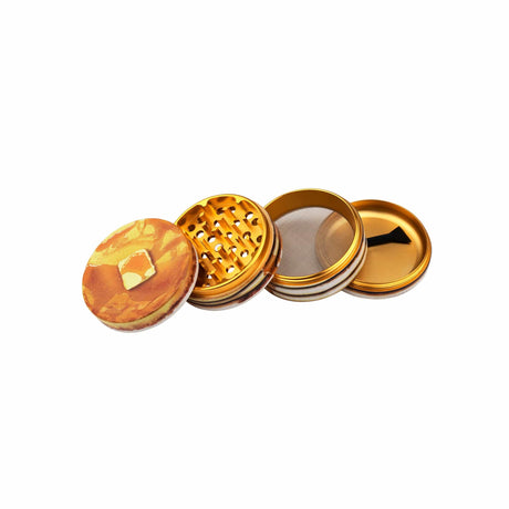 V Syndicate Pancakes 4-Piece SharpShred Grinder, 63mm, golden with pancake design, compact and portable
