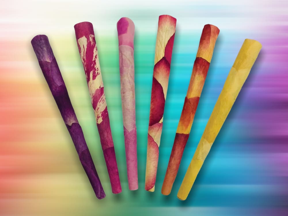 CaliGreenGold Variety Rose Petal King Cones 6-pack on colorful background, ideal for a natural smoking experience